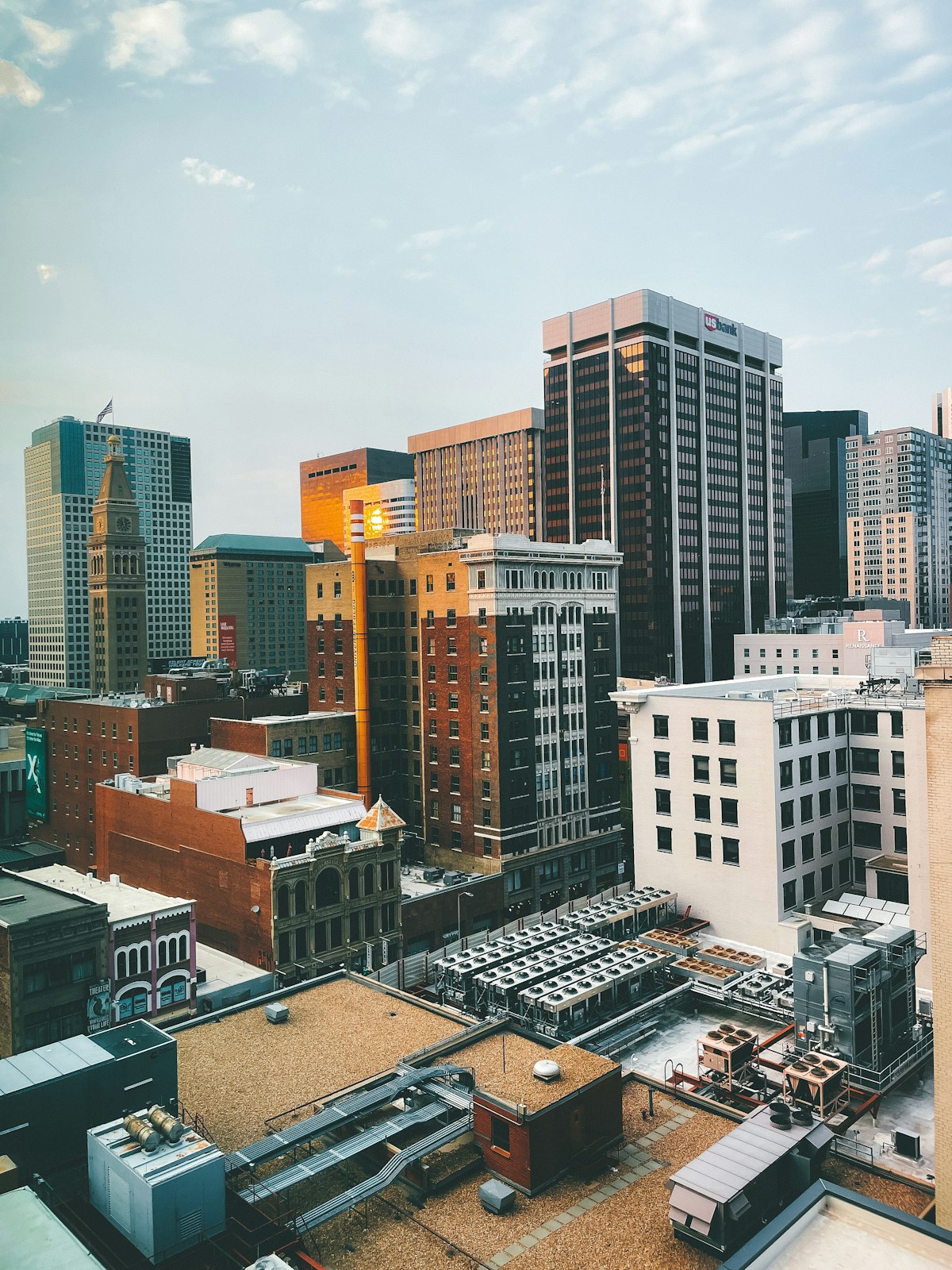 Denver skyline with laptop showing a website design