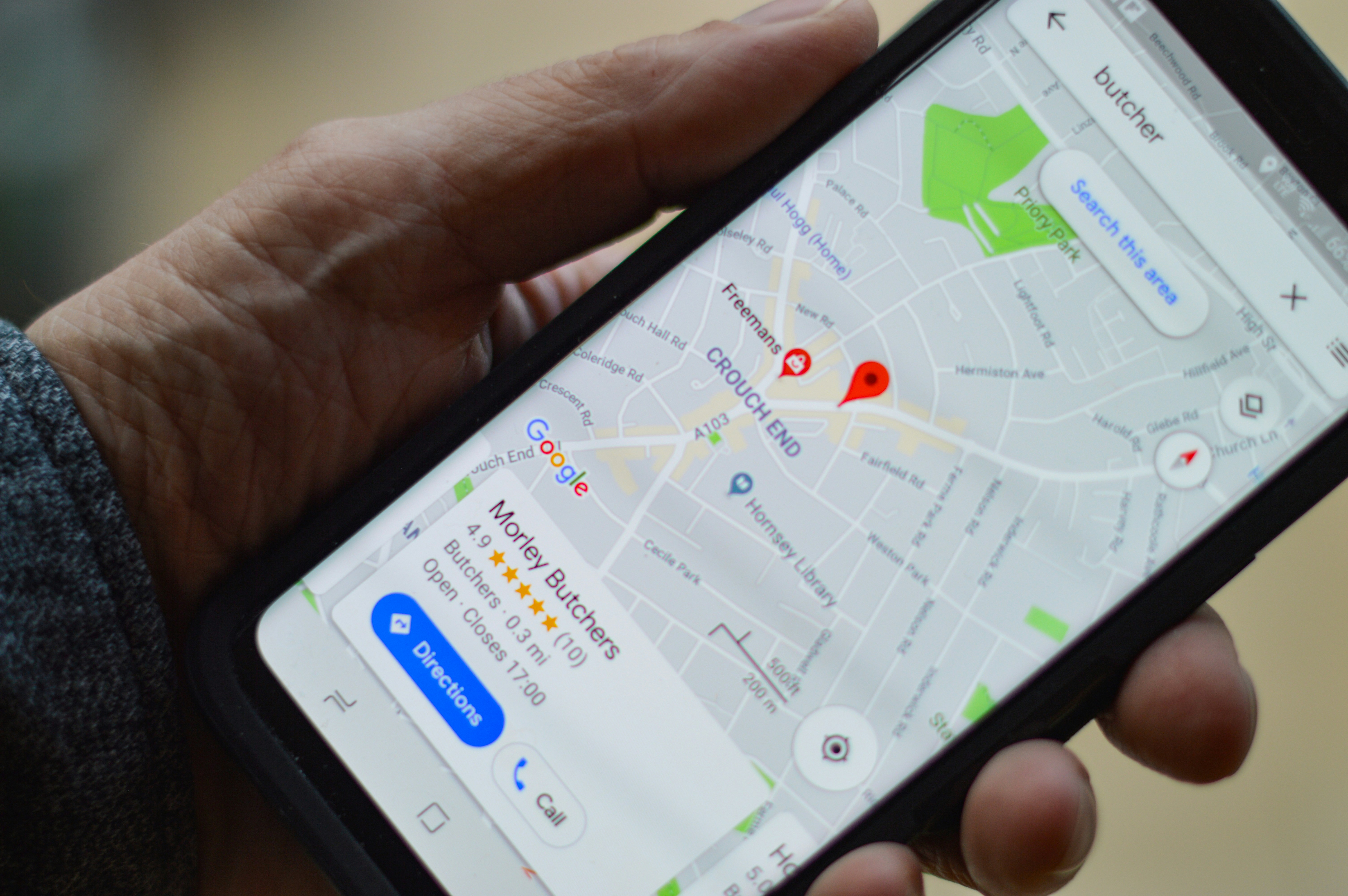 Phone showing Google Maps local search results